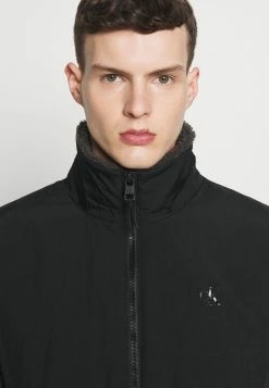 Calvin Klein Jeans SHERPA MIXED HALF ZIP JACKET UNISEX - Veste Mi-saison - Black Olive/black -Calvin Klein Elegant Magasin 9a38f0e3126544668c39a3353a5d7df6