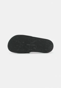 Calvin Klein Jeans SLIDE MONOGRAM - Mules - Black 10 Calvin Klein Jeans SLIDE MONOGRAM - Mules - Black -Calvin Klein Elegant Magasin 9a66261e7122481e9fa5412c757f5639