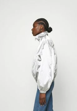 Calvin Klein Jeans ZIP THROUGH - Veste Coupe-vent - Silver 12 Calvin Klein Jeans ZIP THROUGH - Veste Coupe-vent - Silver -Calvin Klein Elegant Magasin 9ada763ce5d043fab404b84fc188aec7