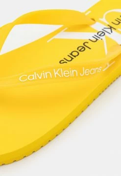 Calvin Klein Jeans BEACH MONOGRAM - Tongs - Super Lemon 8 Calvin Klein Jeans BEACH MONOGRAM - Tongs - Super Lemon -Calvin Klein Elegant Magasin 9b9810df5be24b609d704f30abebf893