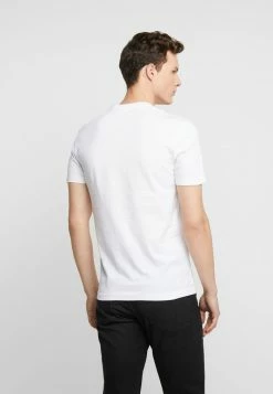 Calvin Klein Jeans ESSENTIAL SLIM TEE - T-shirt Basique - Bright White -Calvin Klein Elegant Magasin a058e7e9686b48fea9a131618f422c7a