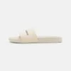 Calvin Klein Jeans SLIDE MONOGRAM - Mules - Eggshell