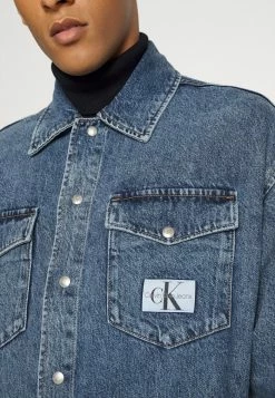 Calvin Klein Jeans OVERSIZED JACKET - Veste En Jean - Denim Medium 13 Calvin Klein Jeans OVERSIZED JACKET - Veste En Jean - Denim Medium -Calvin Klein Elegant Magasin a3cee127fee24484a5b6319dcc4917d2