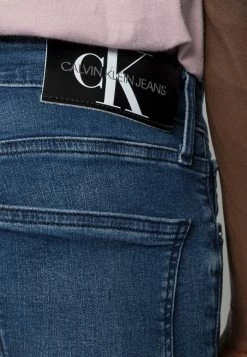 Calvin Klein Jeans SUPER SKINNY - Jean Slim - Denim Dark -Calvin Klein Elegant Magasin a417ac82b79342fe94803638fdeac323