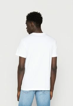 Calvin Klein Jeans DYNAMIC CONTRAST POCKET TEE - T-shirt Basique - Bright White -Calvin Klein Elegant Magasin a46a06cefcf94e37a5b615f12b382271