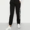 Calvin Klein Jeans VERTICAL MONOGRAM JOG PANTS - Pantalon De Survêtement - Black