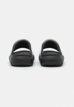 Calvin Klein Jeans UNISEX - Mules - Black/white 8 Calvin Klein Jeans UNISEX - Mules - Black/white -Calvin Klein Elegant Magasin a84fb506269b4137a5f2d4e3651810e2