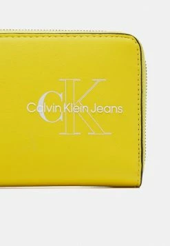 Calvin Klein Jeans SCULPTED ZIP AROUND TWO TONE - Portefeuille - Super Lemon 9 Calvin Klein Jeans SCULPTED ZIP AROUND TWO TONE - Portefeuille - Super Lemon -Calvin Klein Elegant Magasin aa75b120d55b419f9057ad451d203cab