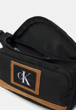 Calvin Klein Jeans SPORT ESSENTIALS WAISTBAG UNISEX - Sac Banane - Black -Calvin Klein Elegant Magasin ab8aa0a11f414d7f96e59133c0d4a492