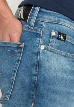 Calvin Klein Jeans SLIM - Jean Slim - Denim Medium 9 Calvin Klein Jeans SLIM - Jean Slim - Denim Medium -Calvin Klein Elegant Magasin ab9de4da81b545b5a32a5edcaa671b21