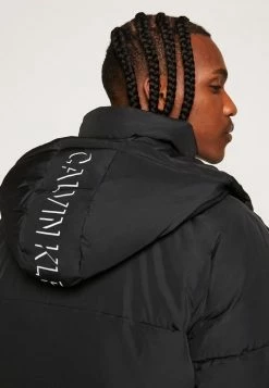 Calvin Klein Jeans BLOCKING HOODED PUFFER - Veste D'hiver - Black -Calvin Klein Elegant Magasin abf52f721c474fbf89c7a9828fa3c542