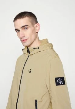 Calvin Klein Jeans UNPADDED HOODED HARRINGTON - Veste Légère - Tawny Sand -Calvin Klein Elegant Magasin ad975351f84a43308ad6f704ba2b2f91