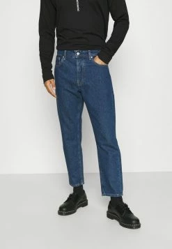 Calvin Klein Jeans SLIM TAPER - Jeans Fuselé - Denim Medium