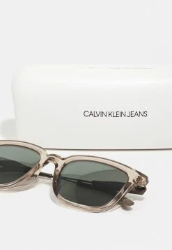 Calvin Klein Jeans UNISEX - Lunettes De Soleil - Crystal Sand -Calvin Klein Elegant Magasin b4b967685dd84ede99a733a0a4ac2861