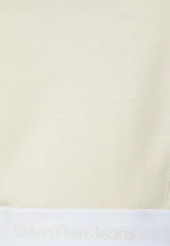 Calvin Klein Jeans CONTRAST TAPE MILANO STRAPPY - Débardeur - Eggshell -Calvin Klein Elegant Magasin b4d0df3fc16f4862a042d280c7df8aad