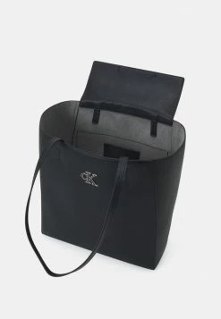 Calvin Klein Jeans MINIMAL MONOGRAM SHOPPER - Sac à Main - Black -Calvin Klein Elegant Magasin b4e77d7939494a7e97994e01fa364942