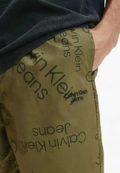 Calvin Klein Jeans ALL-OVER LOGO - Short - Logo Aop Burnt Olive 8 Calvin Klein Jeans ALL-OVER LOGO - Short - Logo Aop Burnt Olive -Calvin Klein Elegant Magasin b7697bebc6864076a60cfc5833655145