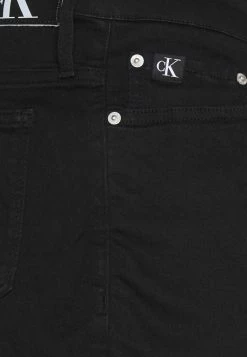 Calvin Klein Jeans SKINNY TAPER - Jean Slim - Denim Black -Calvin Klein Elegant Magasin c18e5685277e441f8e035824c26359fe