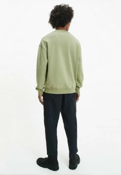 Calvin Klein Jeans DYNAMIC CREW NECK UNISEX - Sweatshirt - Faded Olive -Calvin Klein Elegant Magasin c21cb0ca9248483d806465337692a636