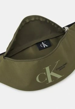 Calvin Klein Jeans SPORT ESSENTIALS UNISEX - Sac Banane - Burnt Olive -Calvin Klein Elegant Magasin c3b7a392ad4e4a699cc94978f58c0a12
