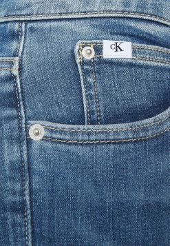 Calvin Klein Jeans HIGH RISE ANKLE - Jeans Skinny - Denim Medium -Calvin Klein Elegant Magasin c479168f47534aeb8c94fe61e0ddce44