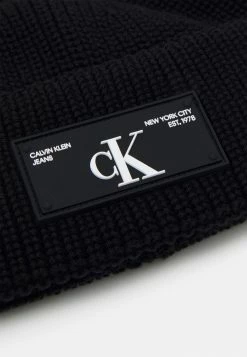 Calvin Klein Jeans SHORT BEANIE UNISEX - Bonnet - Black -Calvin Klein Elegant Magasin c4794a5d26f6479196011951cf62b8cd