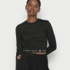 Calvin Klein Jeans REPEAT LOGO MILANO TOP - T-shirt à Manches Longues - Black