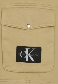 Calvin Klein Jeans MONOGRAM PATCH - Pantalon De Survêtement - Beige -Calvin Klein Elegant Magasin c6696964a3da470caa1be5baab4ce9ab