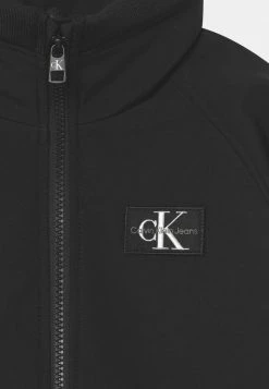 Calvin Klein Jeans Veste Mi-saison - Black -Calvin Klein Elegant Magasin c810e75a2f064e1894d6c063c9c66290