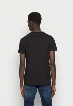 Calvin Klein Jeans SEASONAL MONOGRAM TEE - T-shirt Imprimé - Black/salsa -Calvin Klein Elegant Magasin c9bff30044e34b609c765a469bfdc27b