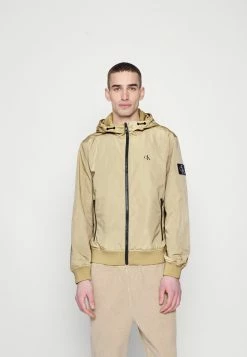 Calvin Klein Jeans UNPADDED HOODED HARRINGTON - Veste Légère - Tawny Sand -Calvin Klein Elegant Magasin c9cb83aeb9014756a41a421681263f08