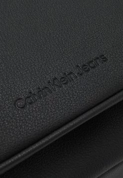 Calvin Klein Jeans ULTRALIGHT FLAP BAG - Sac Bandoulière - Black -Calvin Klein Elegant Magasin cbea105f68804061824eb141b329e1ed