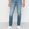 Calvin Klein Jeans SLIM TAPER - Jeans Fuselé - Denim Medium