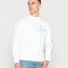 Calvin Klein Jeans DYNAMIC CREW NECK UNISEX - Sweatshirt - Bright White