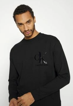 Calvin Klein Jeans SPLICED BACK GRAPHIC - T-shirt à Manches Longues - Black 9 Calvin Klein Jeans SPLICED BACK GRAPHIC - T-shirt à Manches Longues - Black -Calvin Klein Elegant Magasin d26ef7254f414c1194664ebe782b6b7d