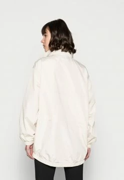 Calvin Klein Jeans WAISTED WINDBREAKER - Veste Légère - Beige -Calvin Klein Elegant Magasin d36b3eec38914d7f96f6a8b416e55356