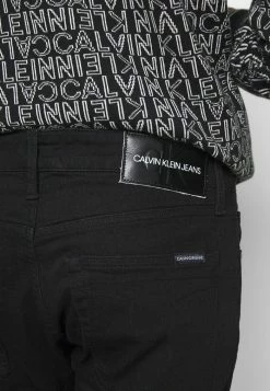 Calvin Klein Jeans SLIM - Jean Slim - Black Denim -Calvin Klein Elegant Magasin d9130a9a0e254e8aa463fc167f6a606e