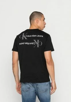 Calvin Klein Jeans URBAN BACK GRAPHIC TEE UNISEX - T-shirt Imprimé - Black -Calvin Klein Elegant Magasin d94a1efa08df420c98b2aa05aae5b164