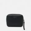 Calvin Klein Jeans MICRO PEBBLE MED POUCH UNISEX - Sac à Main - Black