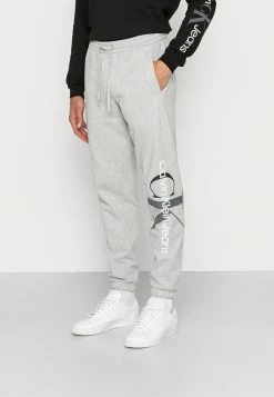 Calvin Klein Jeans TWO TONE MONOGRAM PANT - Pantalon De Survêtement - Light Grey