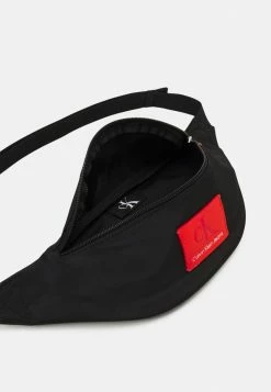 Calvin Klein Jeans WAISTBAG UNISEX - Sac Banane - Black -Calvin Klein Elegant Magasin df5789c1f52a41ca8c97aa518326724f