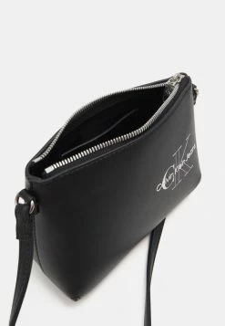 Calvin Klein Jeans SCULPTED CAMERA POUCH TWO TONE - Sac Bandoulière - Black -Calvin Klein Elegant Magasin e05f96dd67eb4c569cbd55ca06d567f9