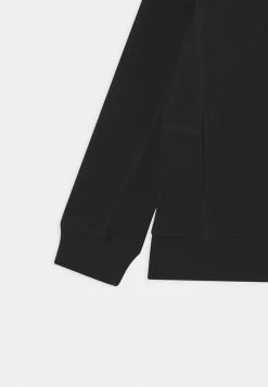 Calvin Klein Jeans BLOCKING BADGE HOODIE - Sweatshirt - Black -Calvin Klein Elegant Magasin e1086a41d21642cea57b55b107960462