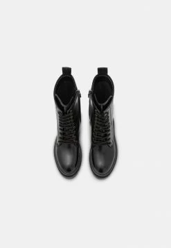 Calvin Klein Jeans FLATFORM MID LACEUP BOOT - Bottes à Plateau - Black -Calvin Klein Elegant Magasin e131c43dd895407cac72e3d76a4e81b0