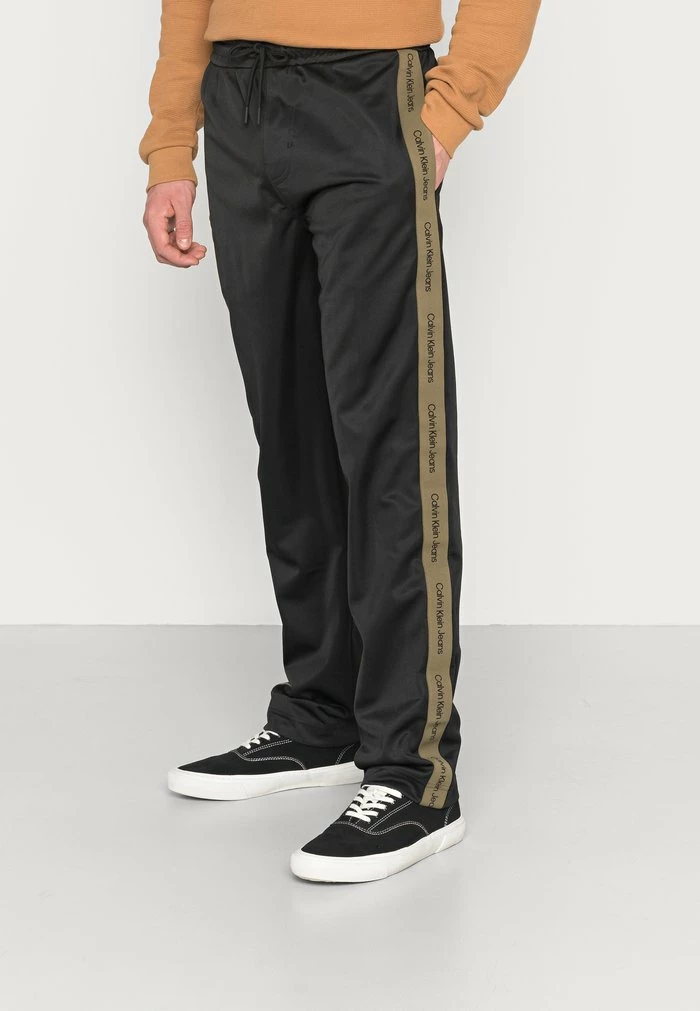 Calvin Klein Jeans CONTRAST TAPE TRACK PANT - Pantalon De Survêtement - Black 1 Calvin Klein Jeans CONTRAST TAPE TRACK PANT - Pantalon De Survêtement - Black