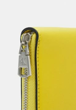 Calvin Klein Jeans SCULPTED ZIP AROUND TWO TONE - Portefeuille - Super Lemon 8 Calvin Klein Jeans SCULPTED ZIP AROUND TWO TONE - Portefeuille - Super Lemon -Calvin Klein Elegant Magasin e51998011abb463baf9b4f5fba2d857c