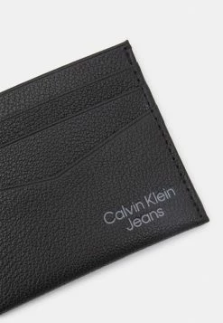 Calvin Klein Jeans MICRO PEBBLE ID CARDHOLDER - Étui Pour Cartes De Visite - Black -Calvin Klein Elegant Magasin e64d86ceb89c4095aca2c809d6333da8