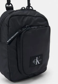 Calvin Klein Jeans VERSATILE CROSSBODY UNISEX - Sac Bandoulière - Black -Calvin Klein Elegant Magasin e8573319037943608c767d2e38e860d0