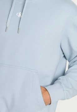 Calvin Klein Jeans CUT OFF TWO TONE MONOGRAM HOODIE UNISEX - Sweat à Capuche - Bayshore Blue -Calvin Klein Elegant Magasin ea43961fec3e4819a830f0c5c5e27dc8
