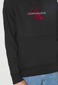 Calvin Klein Jeans ARCHIVAL MONOGRAM HOODIE UNISEX - Sweatshirt - Black/salsa -Calvin Klein Elegant Magasin ea499c71aff5404882729d34fae8be7a